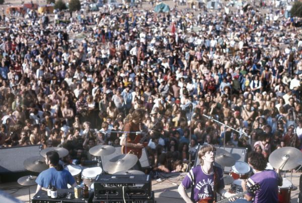 The Grateful Dead, featuring Bill Kreutzmann, Bob Weir, Phil Lesh, and Mickey Hart, playing on stage at the Sound Storm Festival with the audience in the background. (Courtesy of Wisconsin Historical Society)
