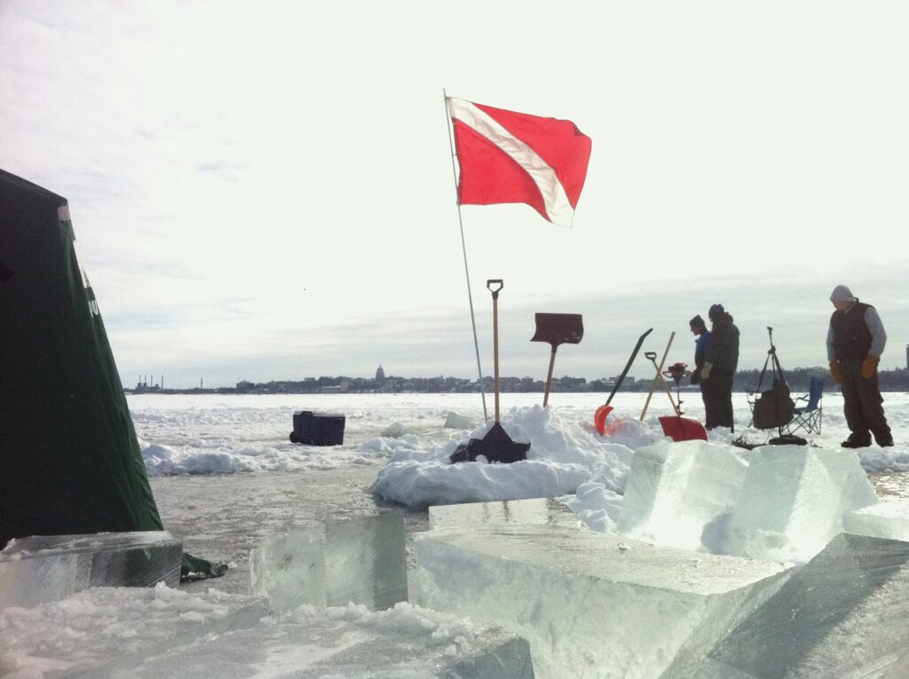 Preparing for an ice dive on Lake Mendota in Madison, Wisconsin. (Photo by Aubrey Ralph)