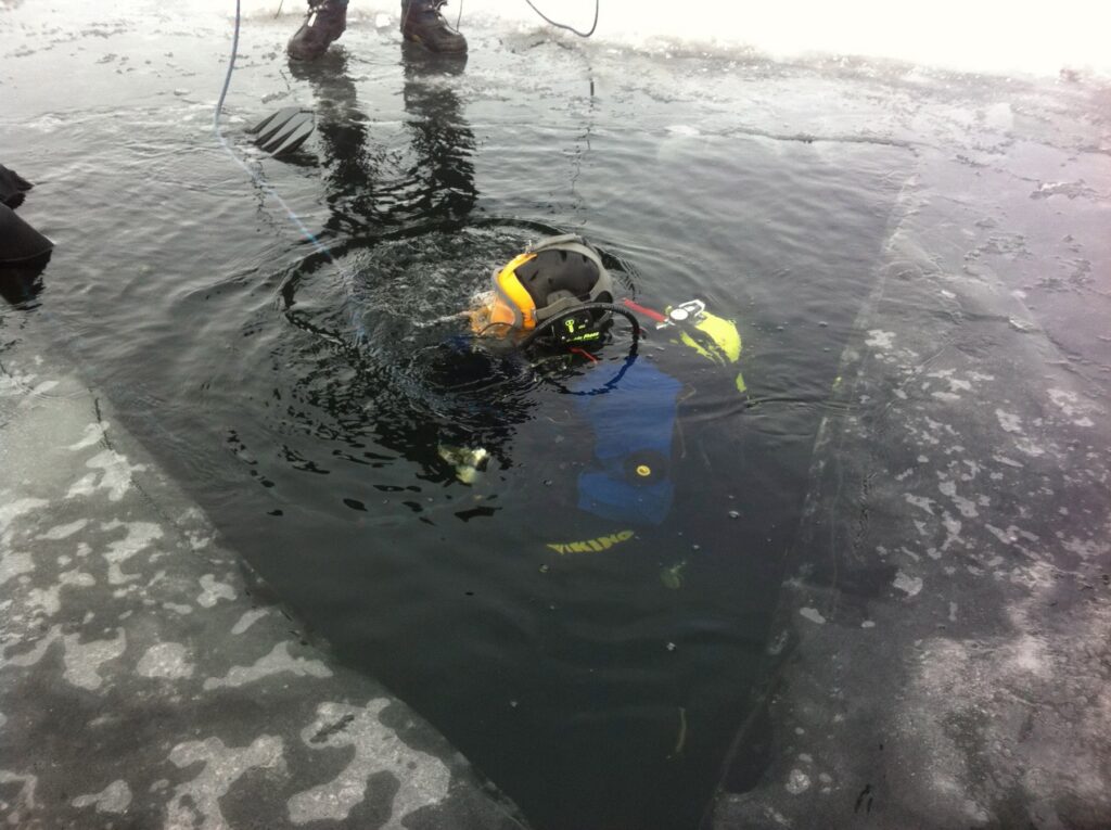 A diver prepares to explore Lake Mendota (Photo by Aubrey Ralph)