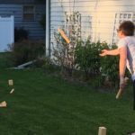 Chris Malina plays Swedish yard game kubb at his home in Fitchburg, Wisconsin.