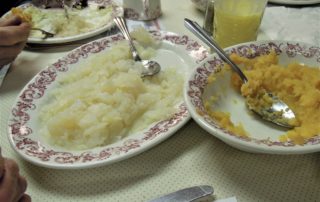 Plates of lutefisk and rutabaga served at Christ Lutheran Church in DeForest, Wisconsin.