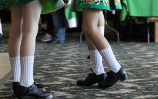 Irish dancers wear their hard shoes and poodle socks. (Photo by Molly McCollum)