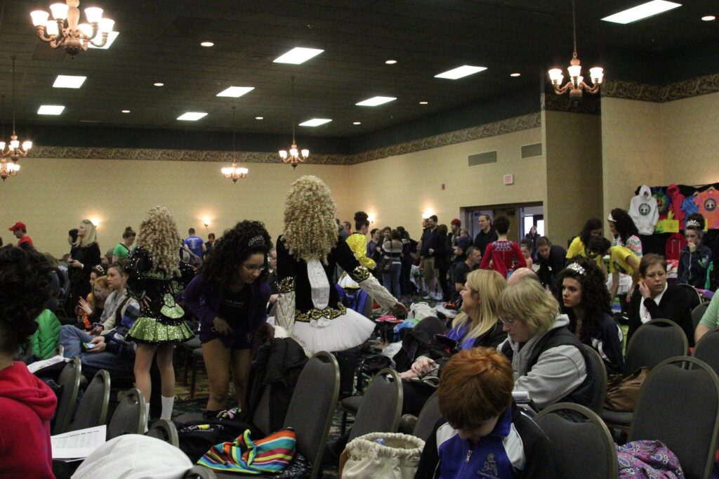 Dancers and their families pack into a conference room as they prepare to compete in different dance competitions throughout the day. (Photo by Molly McCollum)