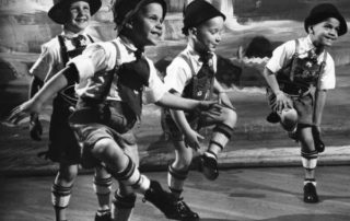 Group of boys in Bavarian costume performing a folk dance at the Bavarian Folk Festival in Milwaukee in 1963. (Credit: Wisconsin Historical Society.)