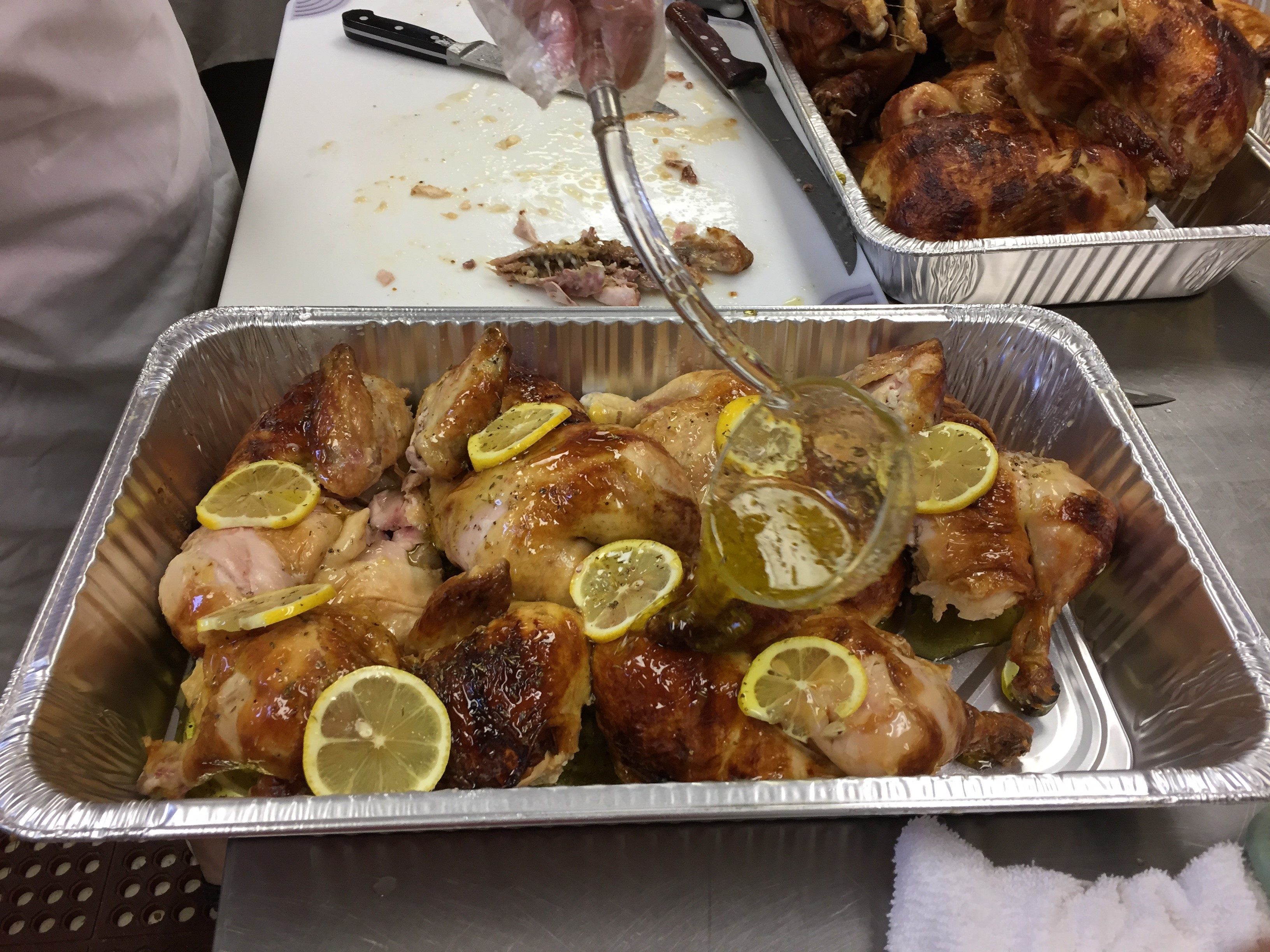 Chickens are basted in olive oil, lemon juice and spices for the popular Greek chicken dinners. (Carol Griskavich/PBS Wisconsin)
