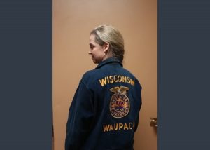 Author June Melby shows off her magical Waupaca FFA blue corduroy jacket. (Photo courtesy of June