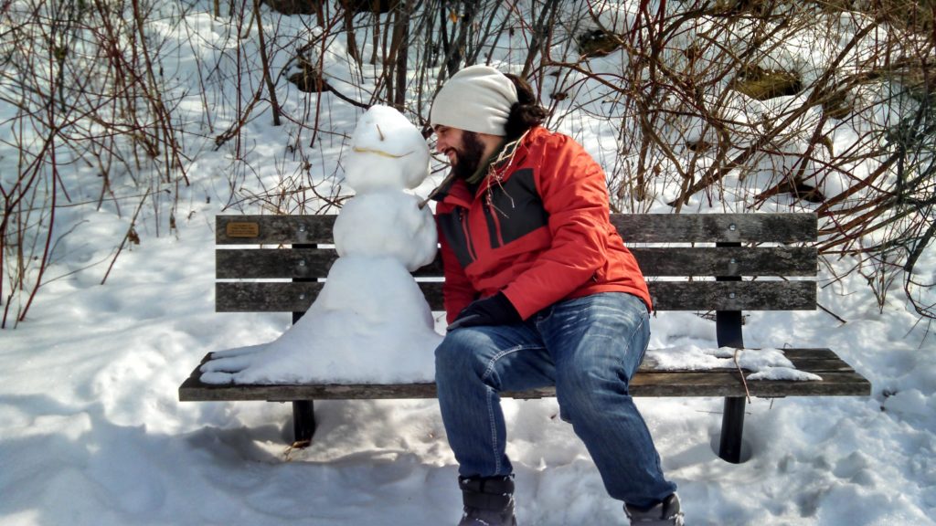 Esteban Touma with a snowman (Courtesy of Autumn Jackson)