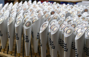 Finished Miller Lite handles sit in the detail room Wednesday, Nov. 7, 2018 at AJS Tap Handles in Random Lake after workers placed the finishing touches for the large order. (Andrea Anderson/WPR)