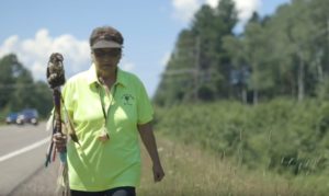 Healing Circle Run participant Agnes Fleming walks with her husband's staff. (Still from "Every Step: A Healing Circle")