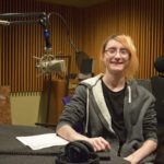 MG21 junior Dante Murray records an interview at WPR's studios. (Maureen McCollum/WPR)