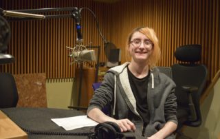 MG21 junior Dante Murray records an interview at WPR's studios. (Maureen McCollum/WPR)