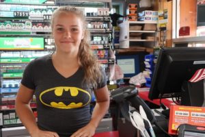 Cashier Abby Nelson at O’Brien’s C-Store in Iron River said some locals were leery of the gathering because of the presence of drugs. While checking out, one gentleman said he thought the Rainbow Family brought “nothing but trouble.” (Danielle Kaeding/WPR)