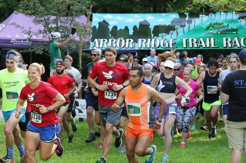 Stephen Strieker starts his Arbor Ridge Trail Race at the Robert O. Cook Memorial Arboretum outside Janesville, Wisconsin with a countdown and cowbell. (Photo by Kevin Sippy)