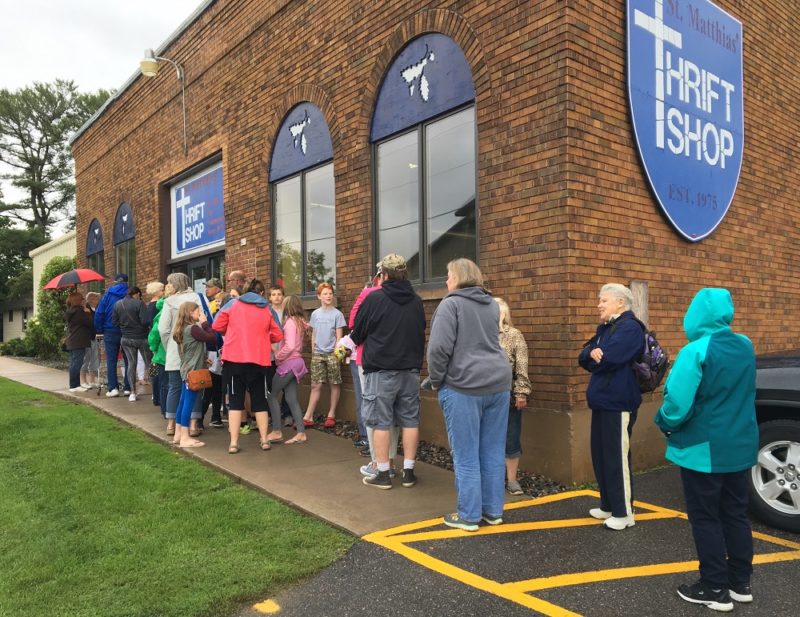 Shoppers line up outside St. Matthias' Thrift Shop in Minocqua, Wisconsin. (Photo by Jane Hampden)