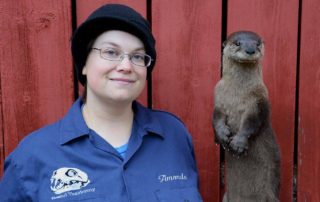 Amanda Bestul and a taxidermic otter she created. (Photo courtesy of Amanda Bestul)