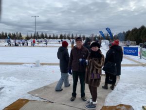 Bill and Kay Nelson live on Kangaroo Lake in Baileys Harbor. They said they were happy to be at this year's Door County Pond Hockey Tournament, even though it wasn't held on a pond. (Megan Hart/WPR)