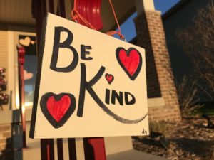 Doris Gassen of Madison says she’s made around 2400 “Be Kind” signs over the years, after being inspired by a similar project in Virginia. She hands them out to people for free and has recently heard from more people wanting signs. (Photo by Jeff McCollum)