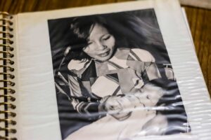 A photograph of Carina Tran’s mother holding her baby daughter Carina.
