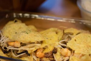 A tray of Vietnamese savory crepes.