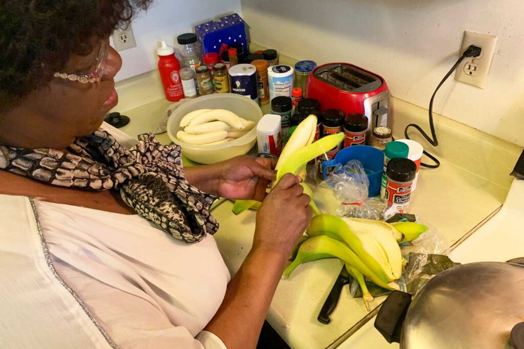 Anne Marie Herman peeling bananas