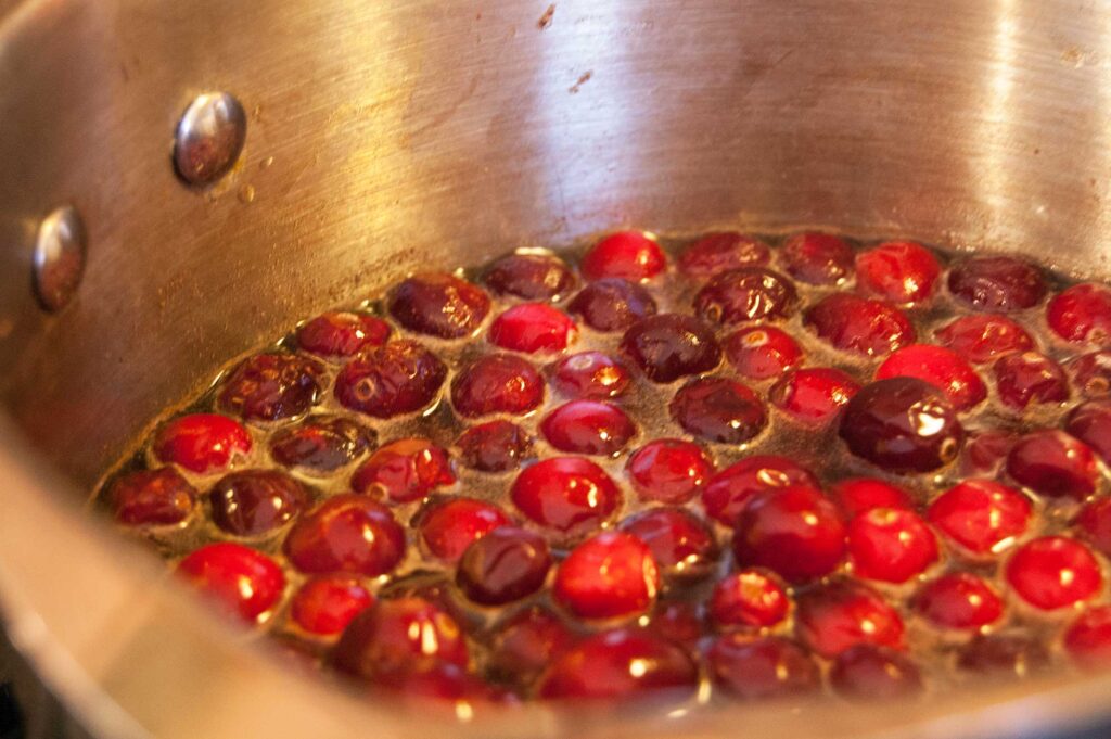 Cranberries cooking in pot