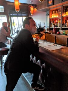 The Jazz Estate owner John Dye at the bar. (Photo by Andy Turner)