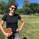 Author Melissa Faliveno at her “absolute favorite place on the planet," center field at an Olbrich Park Softball Field in Madison, Wisconsin. (Maureen McCollum/WPR)
