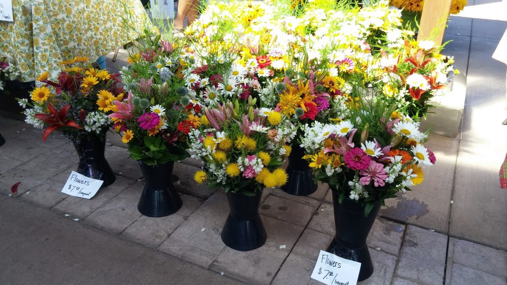 Fresh bouquets right from the garden at a farmers' market in Eau Claire. (Photo by Yia Lor)