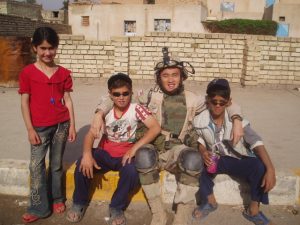 Yauo Yang with Iraqi children in Samarra. (Courtesy of Yauo Yang)