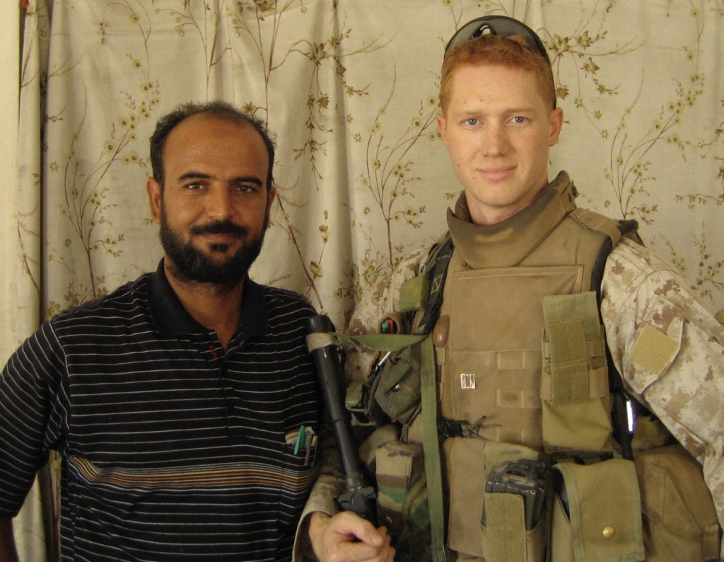 Dr. Mustafa, a professor of nutrition and food science at the University of Baghdad, and Captain Ryan Erisman. Mustafa spoke fluent English and emerged as the security leader for his village's indigenous counterinsurgency forces. (Courtesy of Ryan Erisman)
