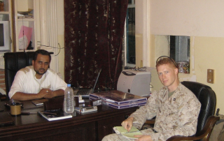 Captain Ryan Erisman (r) and Eifan Sadun Eifan of the Albu Issa tribe in July 2007. "Eifan went by 'Abu Sadun' or his self-assigned callsign, 'Dark,'" said Erisman. "The nephew of Sheik Khamis, the leader of the 70,0000-strong Albu Issa tribe, Abu Sadun organized the tribe's indigenous counterinsurgency forces (ICF) and was key to the partnership between the Marines and ICF. I met with Abu Sadun several times a week to coordinate operations. He was assassinated by a suicide bomber in January 2013." (Courtesy of Ryan Erisman)