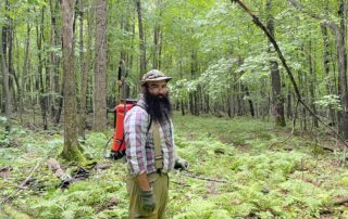 Bryan Box marking trees in Wisconsin's northwoods