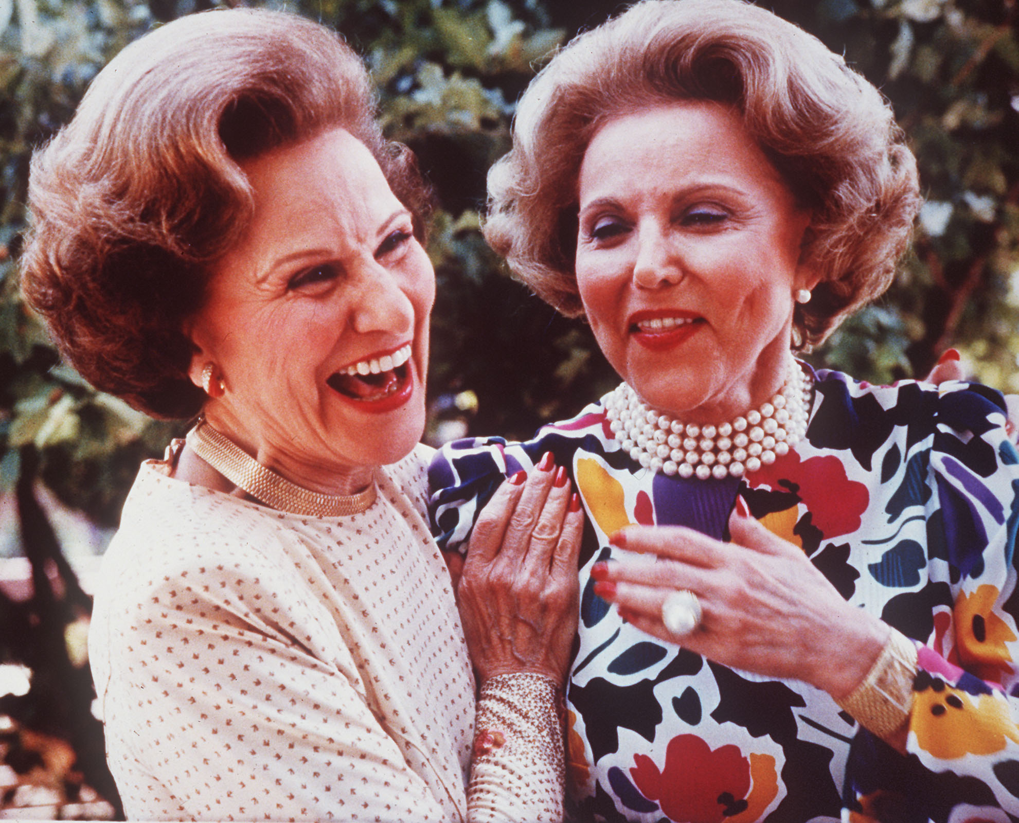 Advice columnist Ann Landers, right, and her twin sister Pauline, who also wrote an advice column as Dear Abby, are shown in a photo from June 1986, at their 50th high school reunion in Sioux City, Iowa.