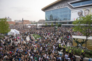 Fans fill the Deer District outside of the Fiserv Forum.