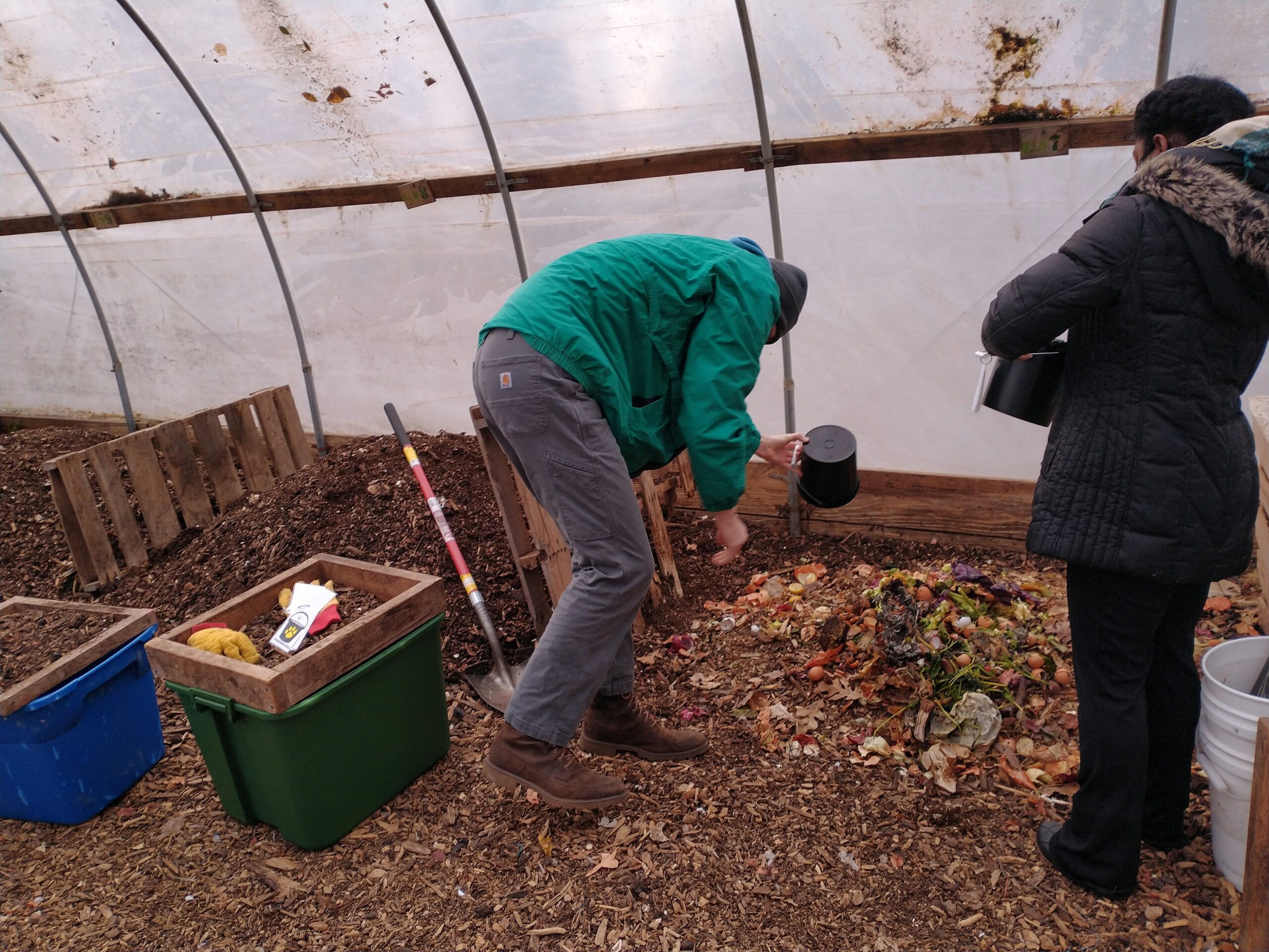 Students collect food scraps for UW-Milwaukee's Panther Pails. (Courtesy of Jessica Gatzow)