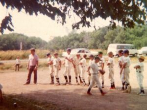 The Beaver Leaguers baseball team from Hegg, Wisconsin. The man standing on the left is the writer's dad, Bob Hardie. The third player to the right from him (the tall kid) is the writer's brother, Kevin. (Courtesy of Chris Hardie)