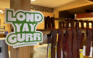 A sticker showing how to pronounce Landjaeger at Bavaria Sausage in Madison (Brad Kolberg/WPR)