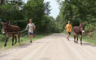 Burro racer climbs hills and valleys with his 700lb. partner
