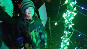 A young Brody Enli gazes with wonder at Christmas lights when his family visited the to the Green Bay Botanical Gardens Light Show several years ago. (Courtesy of the Enli family)