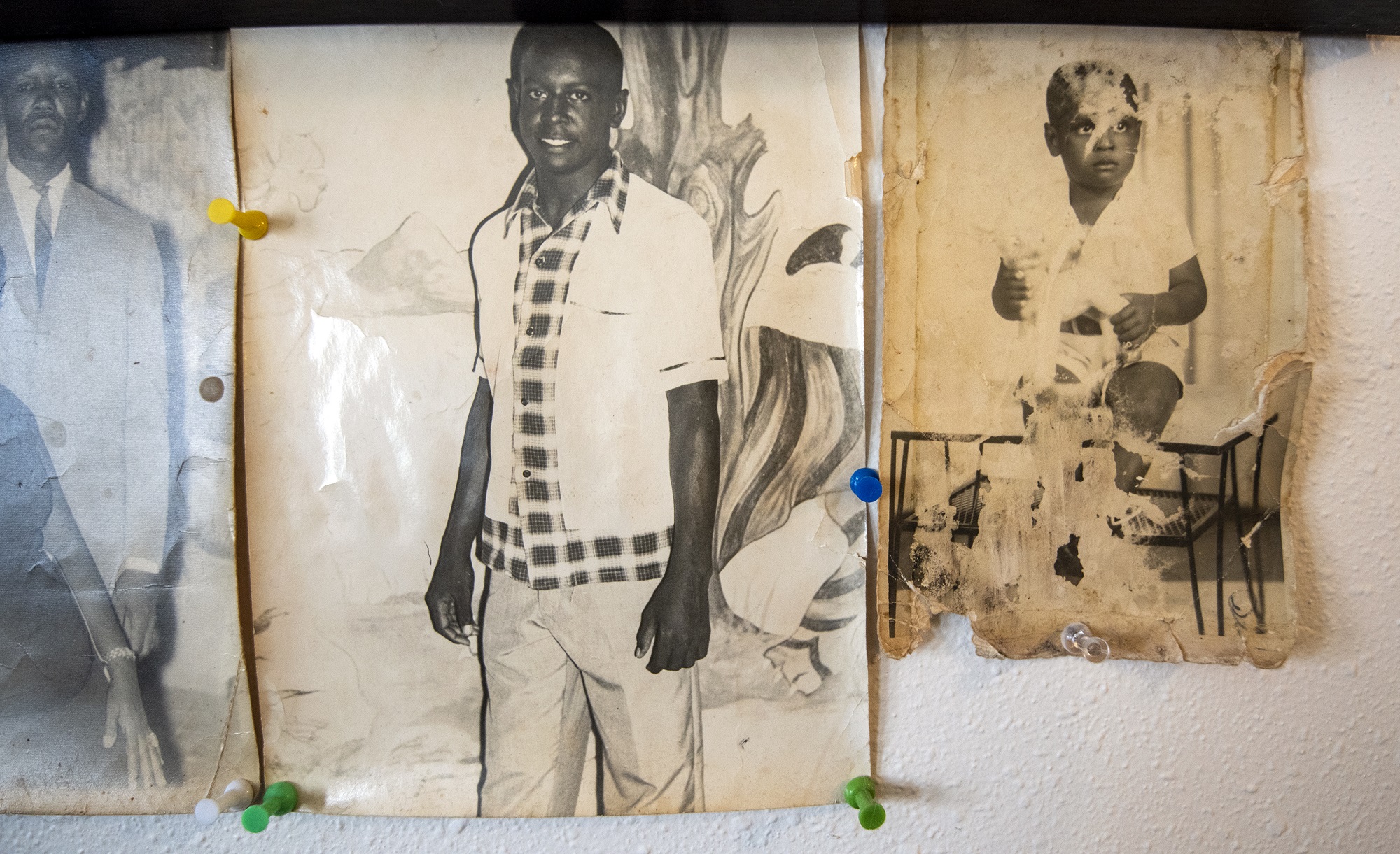 Two photos of a young Osvaldo Durruthy (l) and his father (r). (Angela Major/WPR)