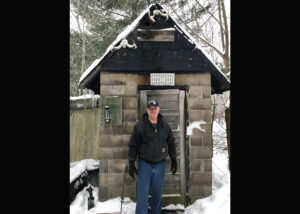 Bob Jahnke in front of his smokehouse. (Photo by Briana Rupel)