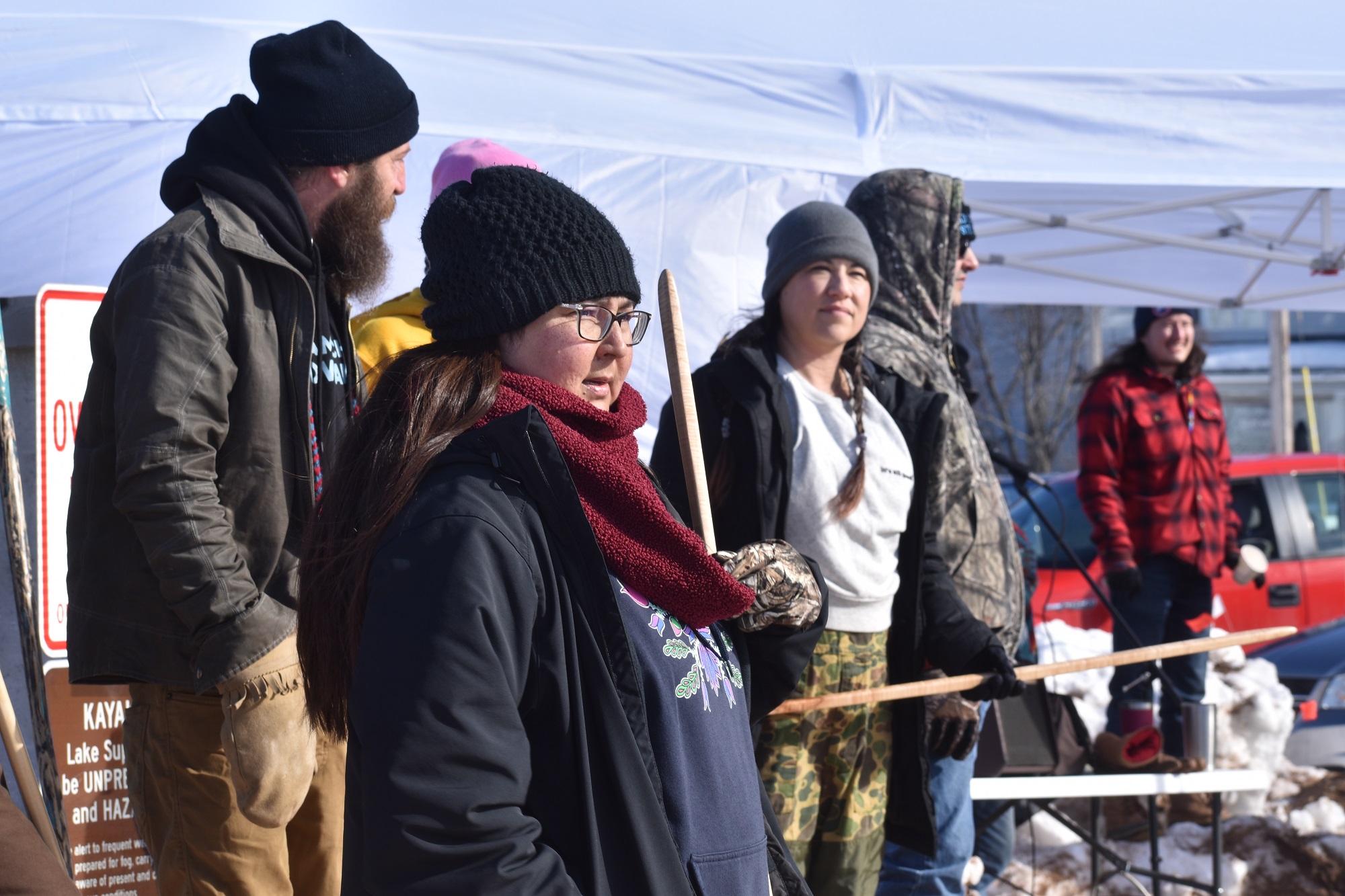 Jenn Dodge prepares to throw a snow snake. She’s a member of the Walpole Island First Nation. Dodge said it’s important to share Indigenous games and bring them back to tribal communities on Feb. 11, 2023. (Danielle Kaeding/WPR)