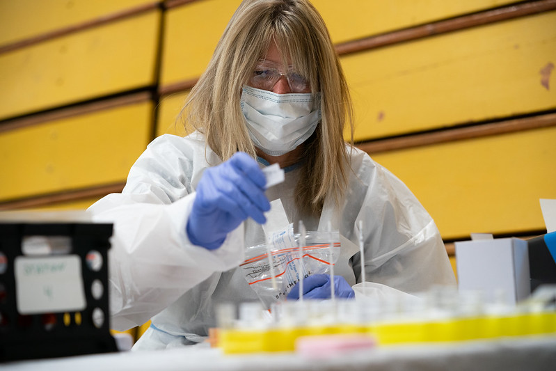 A worker helps run the COVID-19 testing center at UW-Oshkosh in fall 2020. The university implemented rigorous testing to help limit the spread of coronavirus when it returned to in-person learning in the fall of 2020. (Courtesy of UW-Oshkosh)