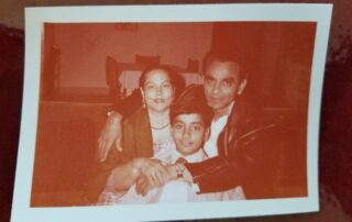 Arif Ahmad's family pose for a photo. (l-r) His mother Ismat Bano, brother Abid, and father Abdul Majeed. (Courtesy of Arif Ahmad)