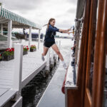Ava Ocker of Lake Geneva, Wis., tries mailboat jumping for the first time during tryouts Tuesday, June 13, 2023, in Lake Geneva, Wis. (Angela Major/WPR)