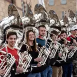 Tuba players in the University of Wisconsin-Madison marching band stand outside of Music Hall on Wednesday, Jan. 25, 2023, at UW-Madison in Madison, Wis. (Angela Major/WPR)