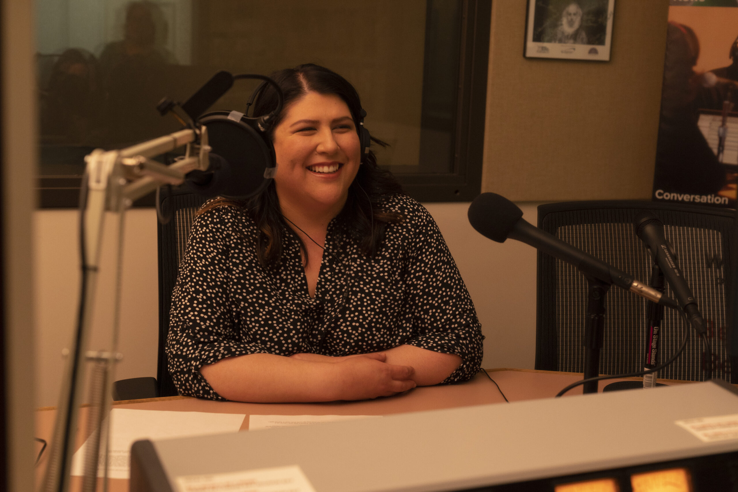 Carina Abrego-Koch records her story for the “Home Is Here” project in Wisconsin Public Radio’s Green Bay studios on May 17, 2023. (Photo by Laura Henderson)