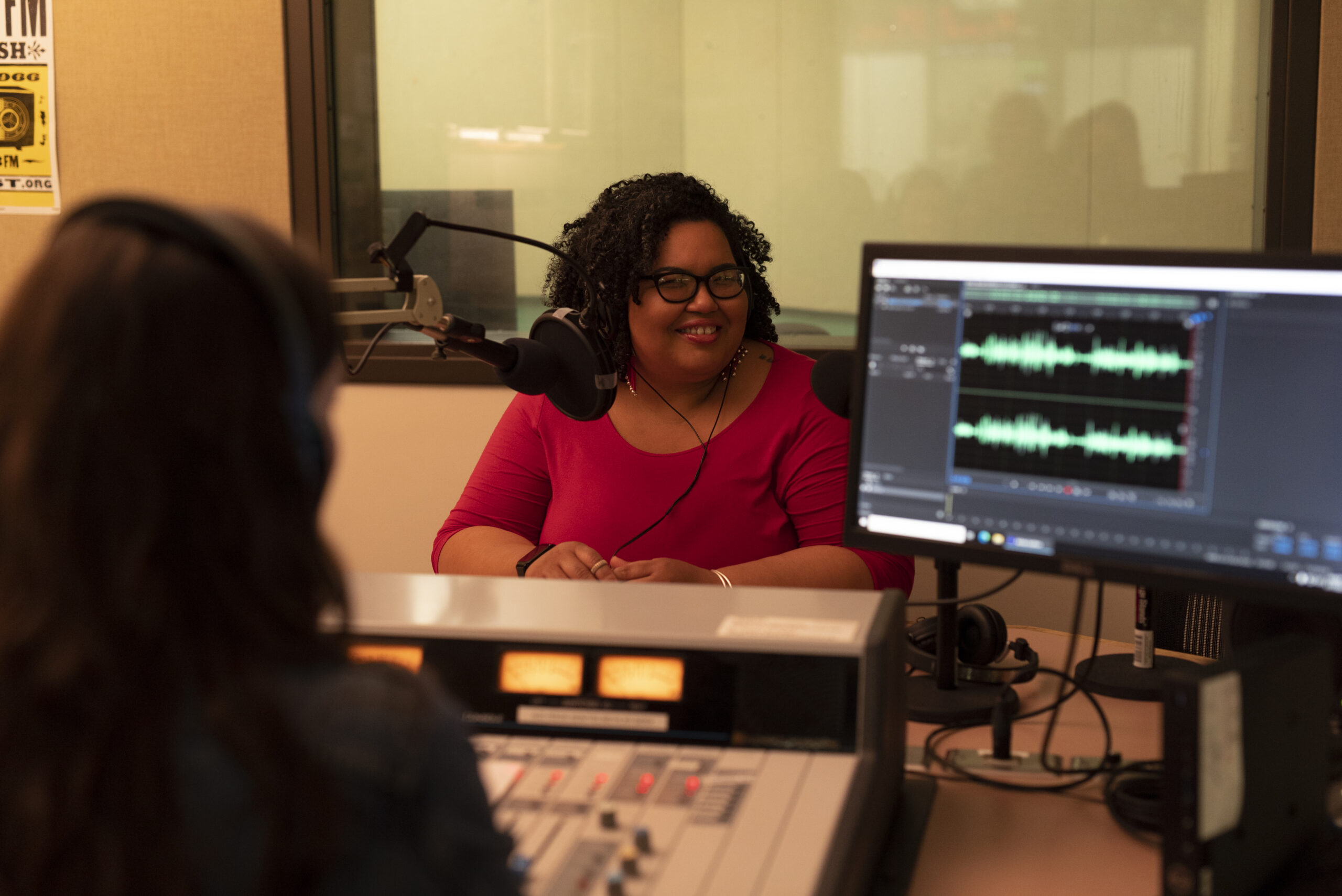 Miriam Brabham records her story for the "Home Is Here" project in Wisconsin Public Radio's Green Bay studios on May 17, 2023. (Photo by Laura Henderson)