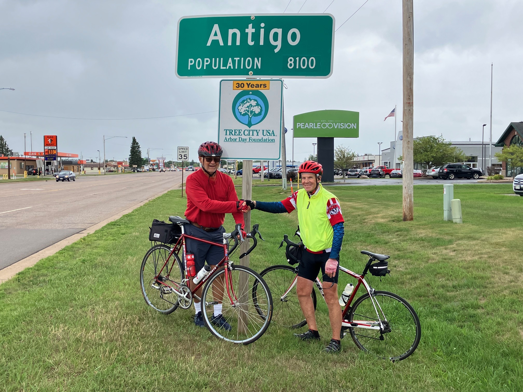 Nick Schmelter and Mark Blaskey at the end of their 900-mile bike ride in Antigo, Wisconsin. (Photo by Emily Blaskey)