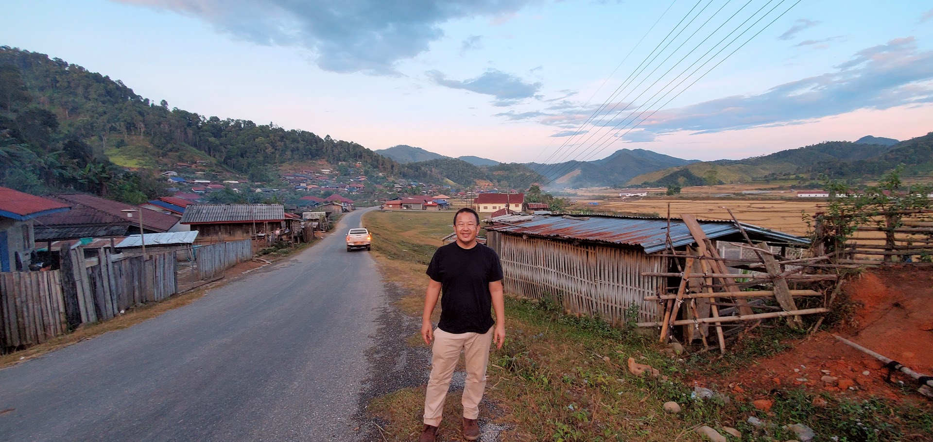 Pao Lor stands on the outskirts of Muang Awe, Laos in November 2022. This is the last village his family lived in before leaving for Thailand. (Courtesy of Pao Lor)